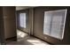 Bedroom with mirrored closet doors and bright windows provides a comfortable and inviting space at 3717 Casey Dr, Las Vegas, NV 89120