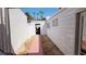 Exterior view of the house with a side walkway and garage at 3717 Casey Dr, Las Vegas, NV 89120