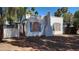 Charming single-story home featuring a brick chimney, light blue shutters, and a well-maintained exterior at 3717 Casey Dr, Las Vegas, NV 89120