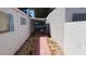 Exterior walkway with a grill and partial shade at 3717 Casey Dr, Las Vegas, NV 89120