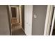 Hallway features tile flooring, white closet doors, and neutral paint, offering functionality and style at 3717 Casey Dr, Las Vegas, NV 89120