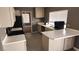 Functional kitchen features tile flooring, counter space and neutral cabinetry at 3717 Casey Dr, Las Vegas, NV 89120