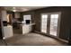 Open living space with a kitchen and access to the backyard at 3717 Casey Dr, Las Vegas, NV 89120