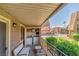 Exterior view of the balcony featuring laundry area, seating, and a landscaped perimeter at 4390 Sandy River Dr # 1, Las Vegas, NV 89103