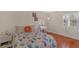Cozy bedroom with a bright vanity and ample natural light from a large window with white curtains at 4390 Sandy River Dr # 1, Las Vegas, NV 89103