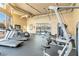 Gym features treadmills, weight machines, and large windows at 4390 Sandy River Dr # 1, Las Vegas, NV 89103