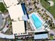 Aerial photograph of a community pool and amenity center with lounge chairs at 4531 S Bay Tree Ct, Pahrump, NV 89061