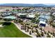 Picturesque community view with a pool, tennis courts, bocce ball, and walking paths at 4531 S Bay Tree Ct, Pahrump, NV 89061