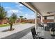 Expansive backyard with a paved patio, lush landscaping, and a perfect spot for outdoor entertaining at 4531 S Bay Tree Ct, Pahrump, NV 89061