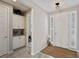 Inviting entryway featuring stylish decor, built-in storage cabinets, and a modern front door with sidelights at 4531 S Bay Tree Ct, Pahrump, NV 89061