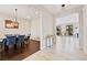 Open-concept entryway with tile floors connects the dining area and living spaces at 4531 S Bay Tree Ct, Pahrump, NV 89061