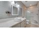 Modern bathroom featuring stylish gray subway tile, vanity with vessel sink, and glass-enclosed shower at 4716 Cohiba Way, North Las Vegas, NV 89031
