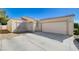 Charming single-story home with a two-car garage and low maintenance desert landscaping at 4716 Cohiba Way, North Las Vegas, NV 89031