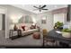 Cozy home office space featuring a comfortable sofa, modern desk, and ample natural light at 5151 Capucina St # Lot 1, Las Vegas, NV 89122