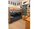 Bedroom with a wooden bunk bed and chest featuring sports team decor at 5158 S Jones Blvd # 105, Las Vegas, NV 89118