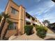 Exterior view of a multi-story apartment building with balconies and desert landscaping at 5158 S Jones Blvd # 105, Las Vegas, NV 89118