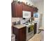 Well-maintained kitchen with white appliances and wooden cabinets at 5158 S Jones Blvd # 105, Las Vegas, NV 89118