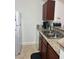 The kitchen features granite countertops and ample cabinetry at 5158 S Jones Blvd # 105, Las Vegas, NV 89118