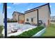 Outdoor space features a built-in seating area, lush greenery, string lights perfect for entertaining or relaxing at 5169 Capucina St # Lot 4, Las Vegas, NV 89122