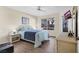 Cozy bedroom featuring a comfortable bed, side table, and natural lighting at 5235 Caspian Springs St # 101, Las Vegas, NV 89120