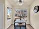 Inviting dining area with a modern ceiling fan and natural light at 5235 Caspian Springs St # 101, Las Vegas, NV 89120
