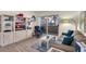 Comfortable living room with a sliding glass door, allowing natural light to fill the room at 5235 Caspian Springs St # 101, Las Vegas, NV 89120