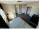 Bright bedroom featuring a window and carpet, plus space for a desk and bed at 5320 Portavilla Ct # 203, Las Vegas, NV 89122