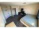 Spacious bedroom featuring a closet with sliding doors, carpet, and neutral walls at 5320 Portavilla Ct # 203, Las Vegas, NV 89122