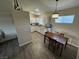 Inviting dining area next to a bright kitchen, perfect for everyday meals at 5320 Portavilla Ct # 203, Las Vegas, NV 89122