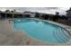 Large community pool providing residents a place to cool off and relax during warm weather at 5320 Portavilla Ct # 203, Las Vegas, NV 89122