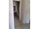 Bathroom visible from hallway, featuring vanity with granite countertop and toilet at 5750 E Hacienda Ave # 117, Las Vegas, NV 89122