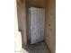 Close-up of condo's entrance door with metal security gate at 5750 E Hacienda Ave # 117, Las Vegas, NV 89122