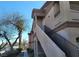 Exterior view of the condo showing the stairs leading up to the unit at 5750 E Hacienda Ave # 117, Las Vegas, NV 89122