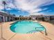 View of sparkling community pool with lounge area and poolside amenities at 5841 Medallion Dr # 202, Las Vegas, NV 89122