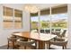 Formal dining area with views of the pool and mountains at 59 Reflection Bay Dr, Henderson, NV 89011