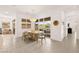 Open floor plan dining room with backyard views at 59 Reflection Bay Dr, Henderson, NV 89011