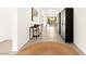 Bright hallway with tiled floors, modern decor, and stylish rug at 59 Reflection Bay Dr, Henderson, NV 89011