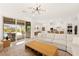 Open-concept living space with access to a patio, blending indoor and outdoor living at 59 Reflection Bay Dr, Henderson, NV 89011