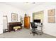 Bright office with a piano, desk, and natural lighting at 59 Reflection Bay Dr, Henderson, NV 89011