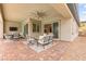 Covered patio with comfortable seating and views at 59 Reflection Bay Dr, Henderson, NV 89011