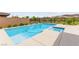 Clear pool surrounded by beautiful desert landscaping and mountains at 59 Reflection Bay Dr, Henderson, NV 89011