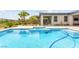 This beautiful pool has an attached spa with plenty of space for outdoor living at 59 Reflection Bay Dr, Henderson, NV 89011