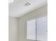 Window lets light into the bedroom; air vent on the ceiling; clean walls at 6064 Isola Peak Ave, Las Vegas, NV 89122