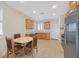 Eat-in kitchen featuring stainless steel appliances and tiled flooring at 6064 Isola Peak Ave, Las Vegas, NV 89122