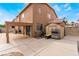 Large backyard showcasing an entertainment area, a shed, and ample space for activities at 6141 Babson Ave, Las Vegas, NV 89110