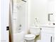 Bright bathroom featuring a shower-tub combo and white vanity at 6198 Pinewood Ave, Las Vegas, NV 89103
