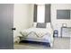 Bedroom with neutral colors, modern decor, and ample natural light at 6198 Pinewood Ave, Las Vegas, NV 89103