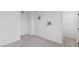 A bright bedroom with neutral carpeting. Two pictures are on the wall at 6955 Elysian Valley Ave, Las Vegas, NV 89113