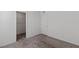 Bedroom with neutral walls and carpet featuring a closet at 6955 Elysian Valley Ave, Las Vegas, NV 89113