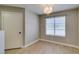 This is a bedroom with hardwood flooring, a window, and a closet at 698 S Racetrack Rd # 114, Henderson, NV 89015